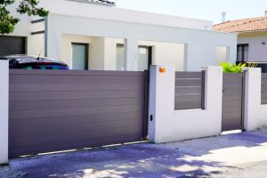Portes sectionnelles et portails motorisés : bien choisir et entretenir ses automatismes